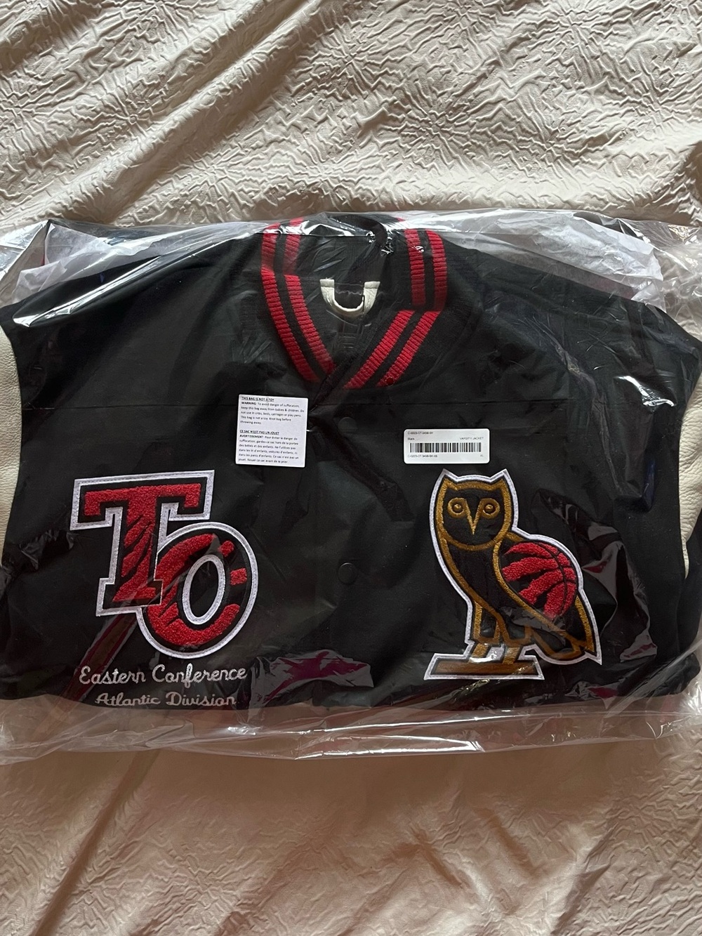 OVO® / NBA TORONTO RAPTORS VARSITY JACKET - BLACK